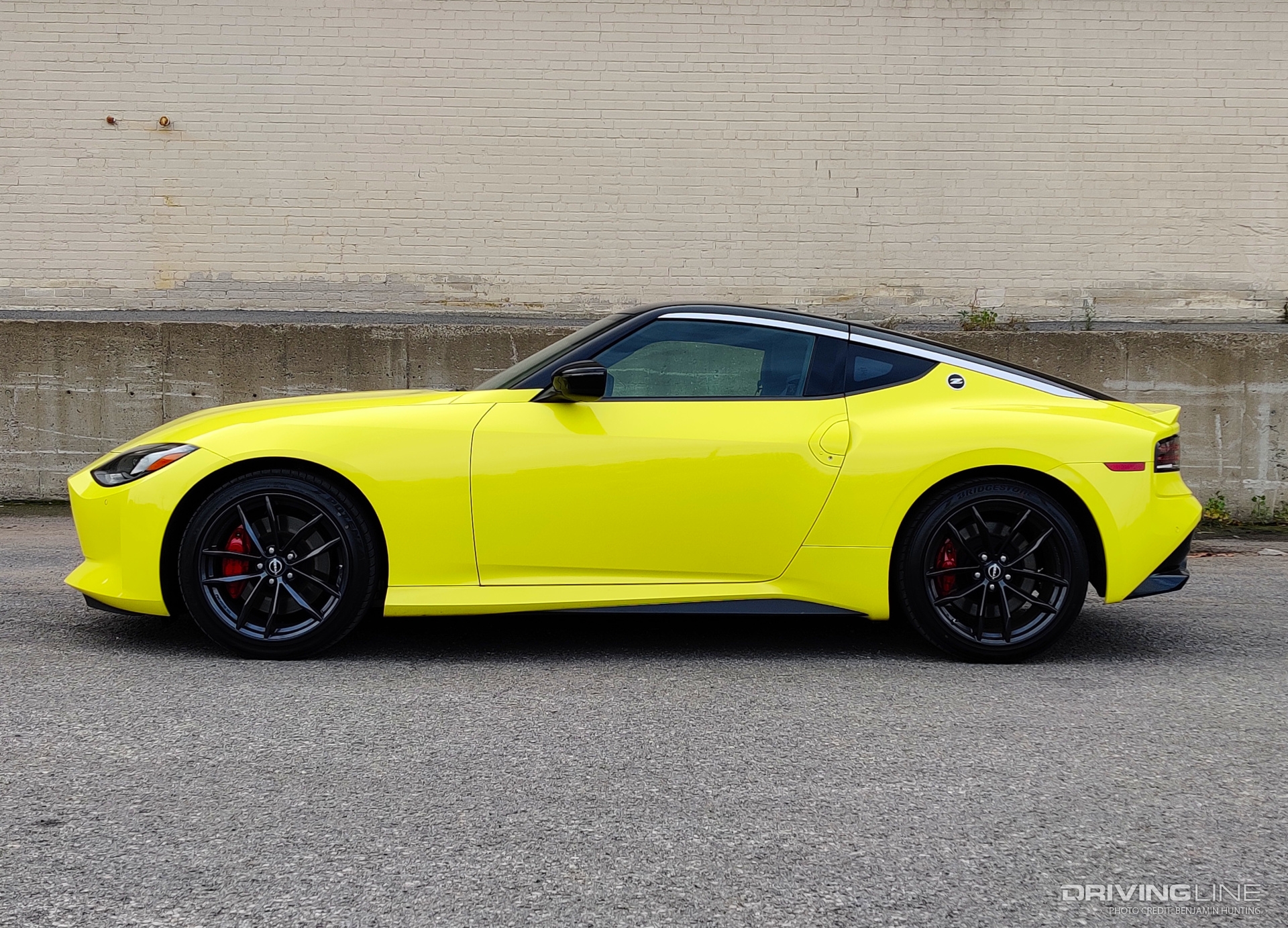 Nissan Z side view yellow