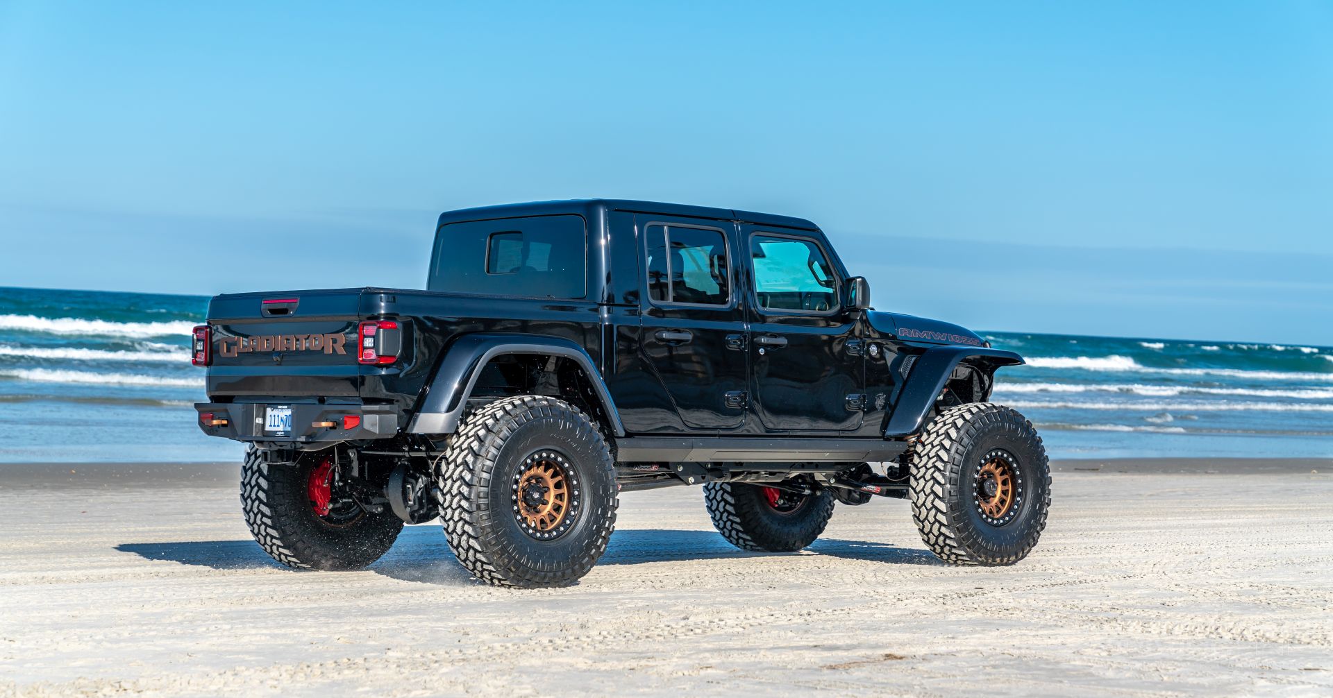 AMW 4x4 Demon 170 Jeep Gladiator Driving On Daytona Beach