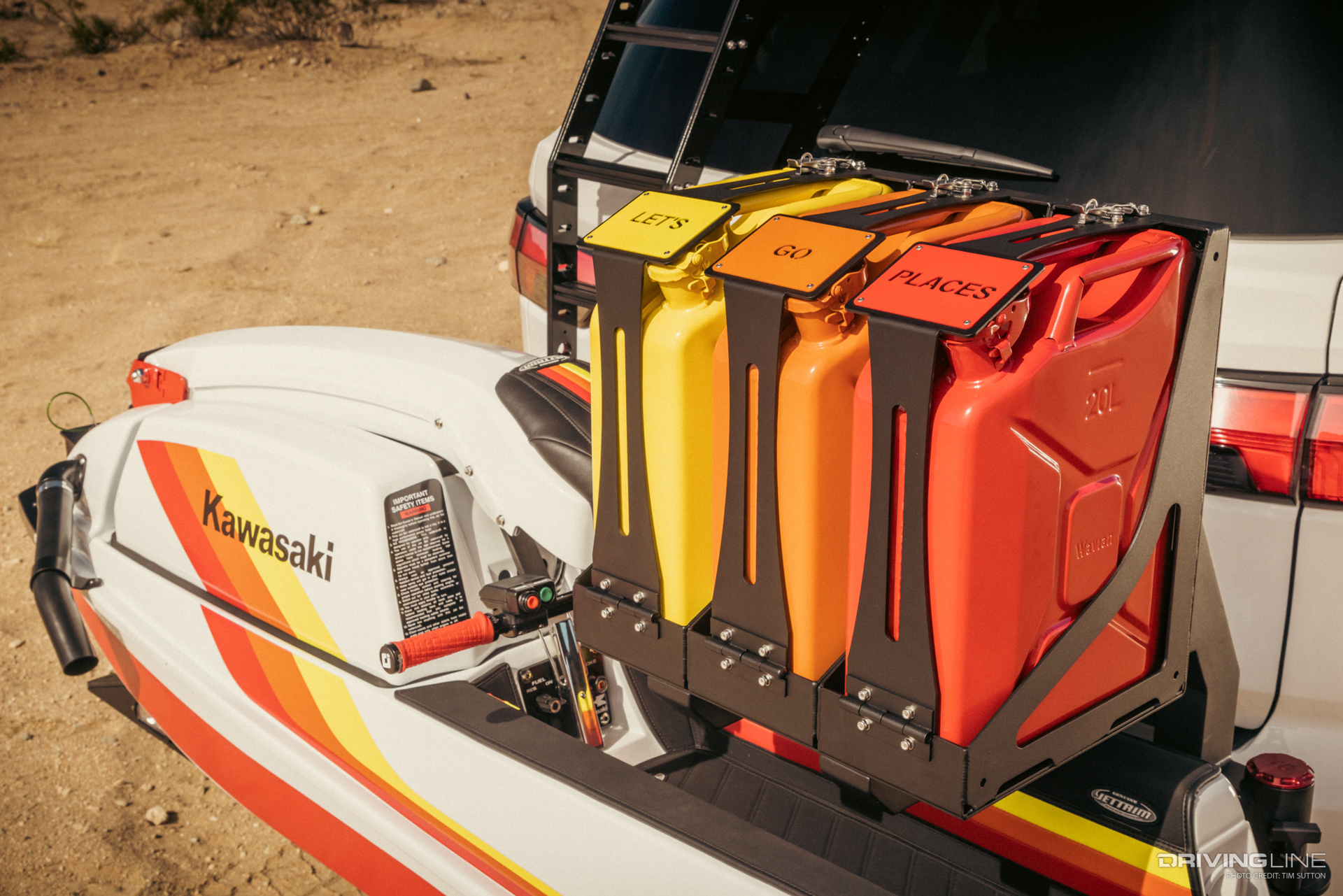 Custom painted jerry cans and Jet ski on the back of 2023 Toyota Sequoia Overland Concept