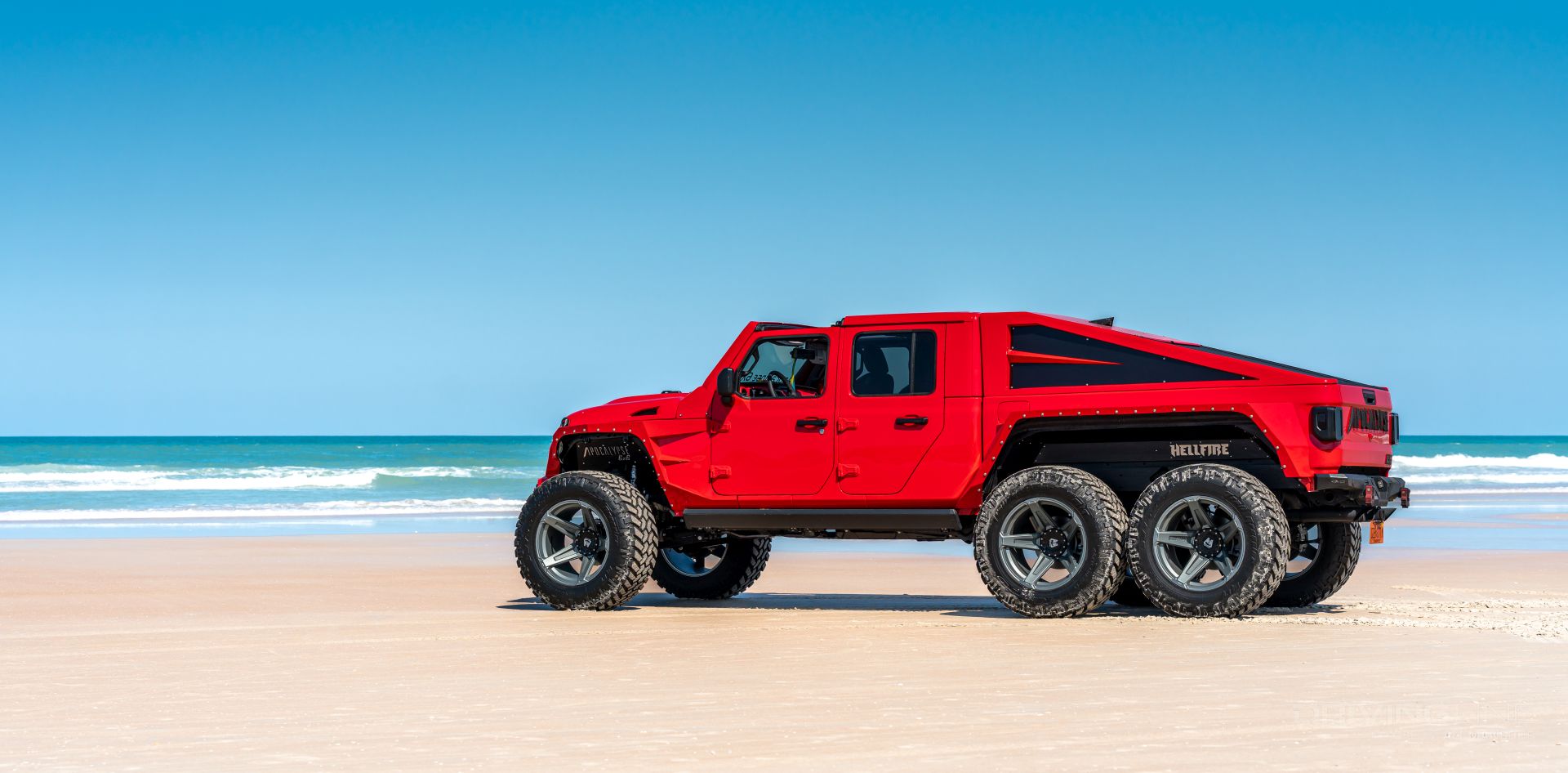 Red Jeep Gladiator 6x6 on Daytona Beach FL Apocalypse 6x6
