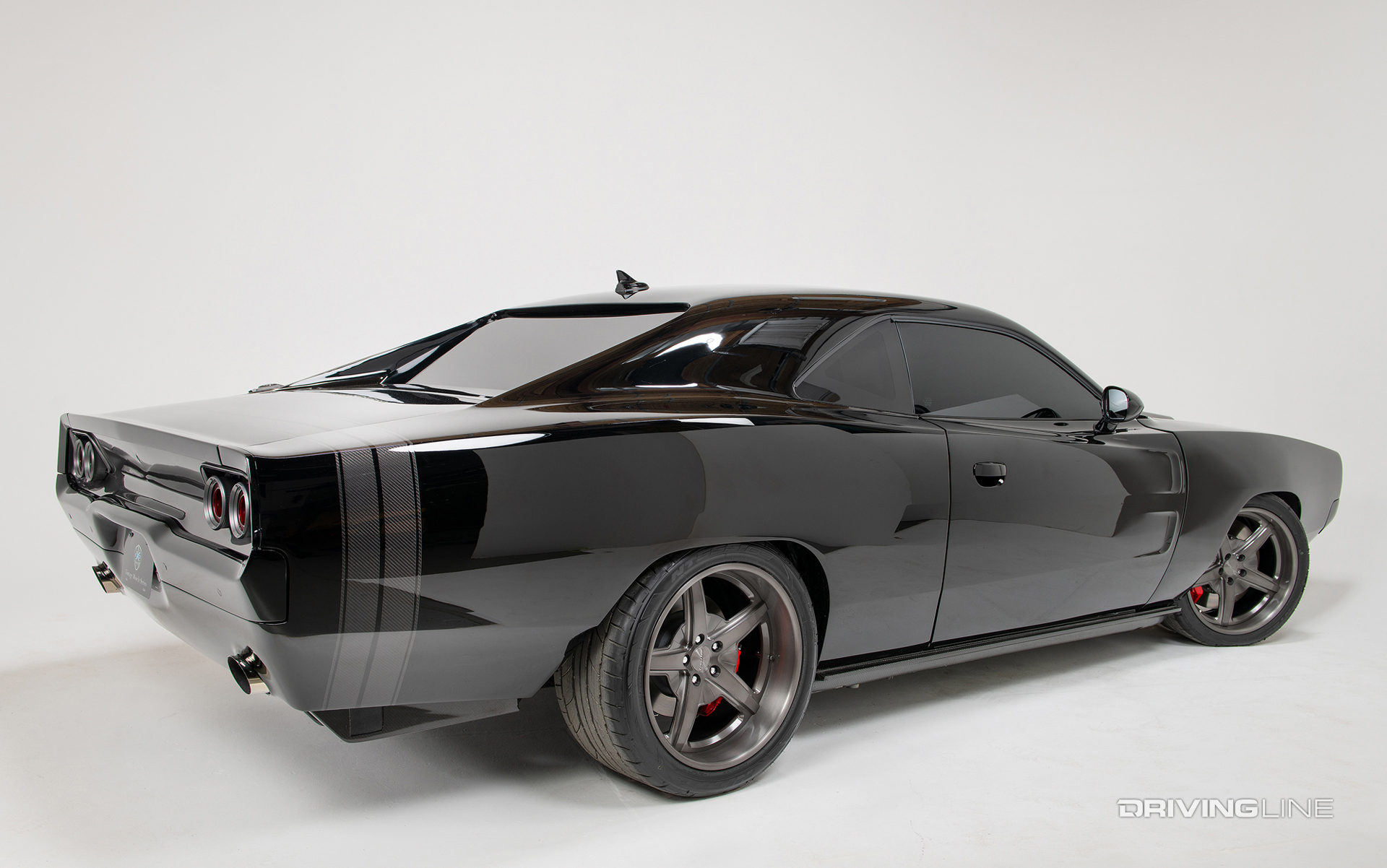 exomod carbon fiber muscle car with nitto nt555 g2 tires in studio