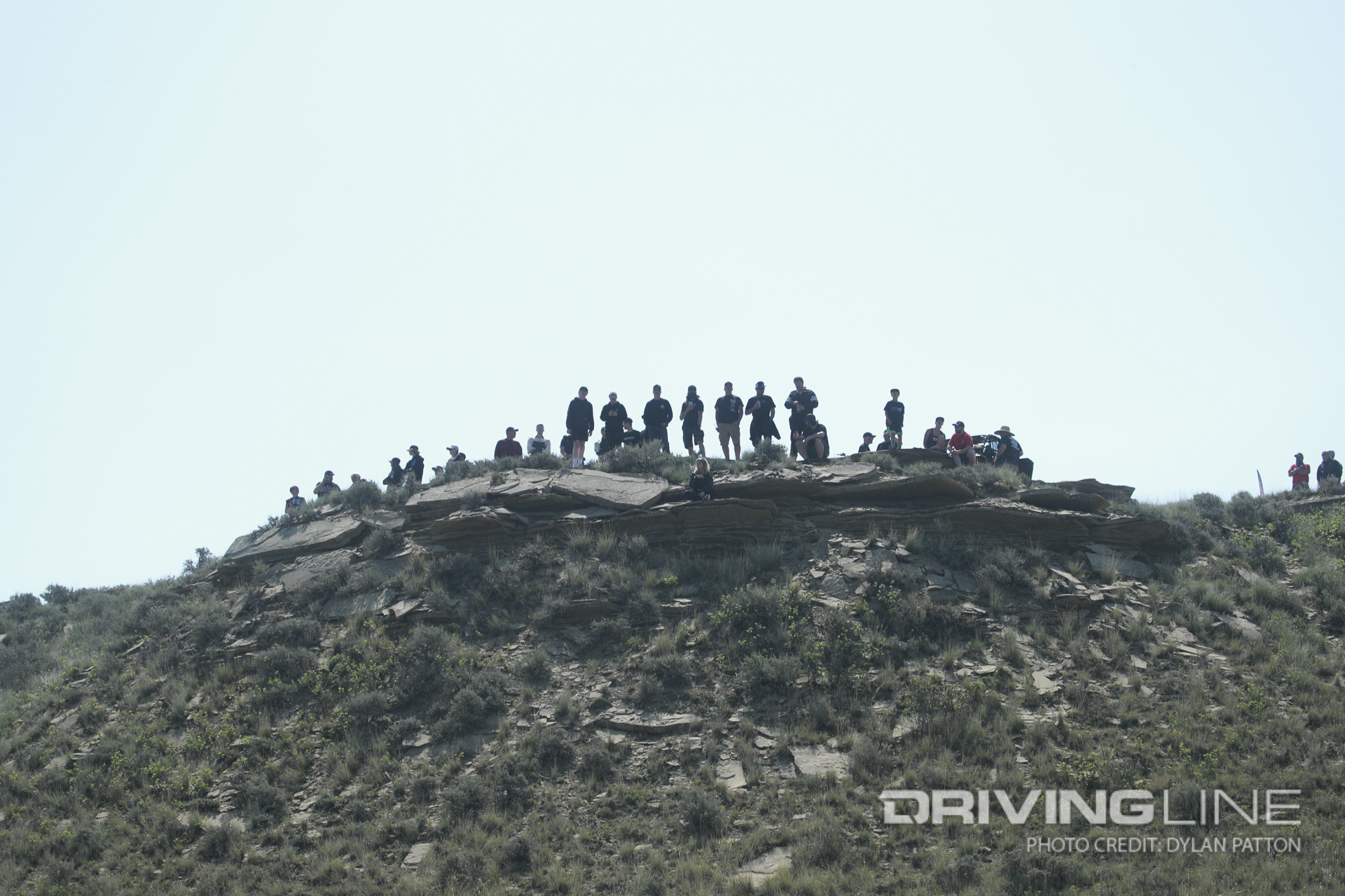 People on a cliff watching off-road racing at 2023 Ultra4 Big Sky 200