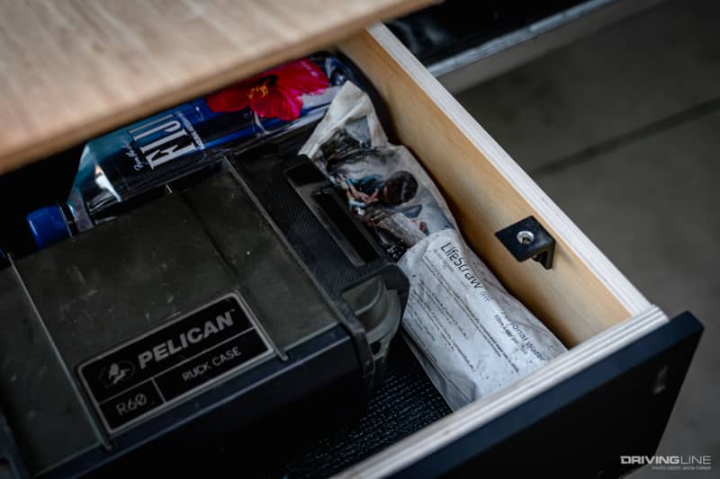Lifestraw and water bottle in truck drawer