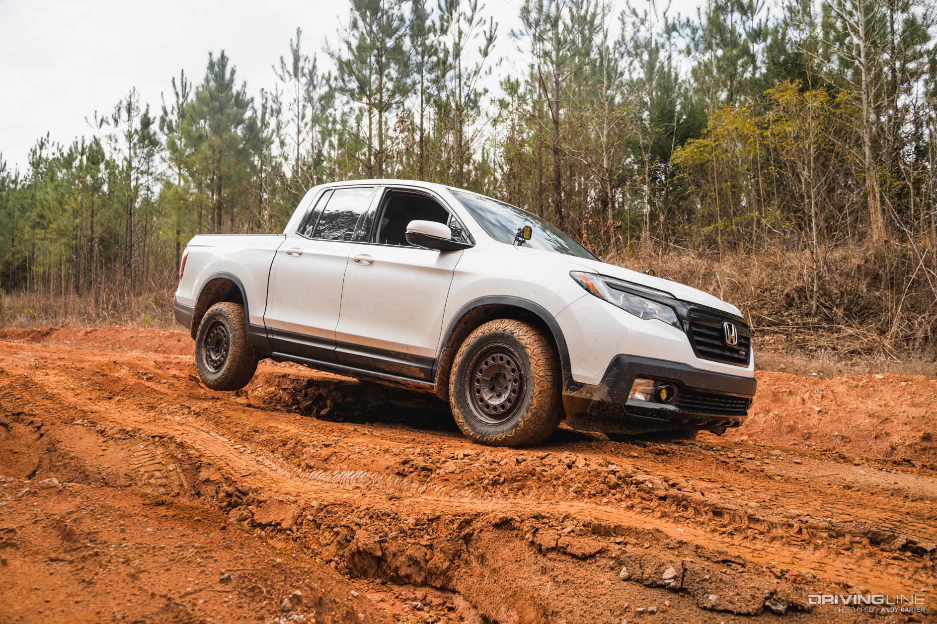 Honda Ridgeline on clay road