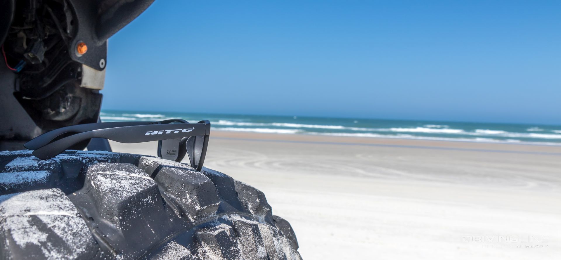 Nitto Sunglasses on Nitto Trail Grappler tire at daytona beach