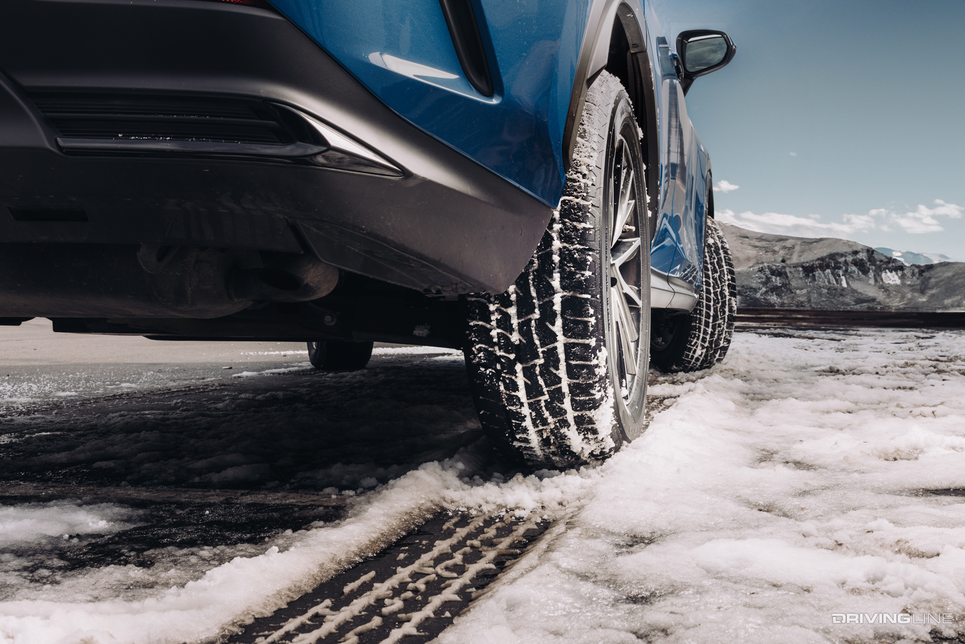 Nitto Motivo 365 all season tire on blue SUV in winter conditions