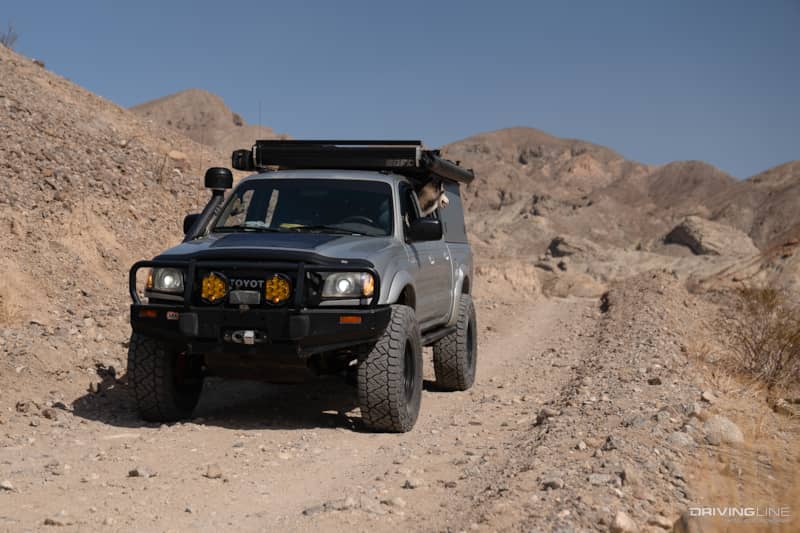 silver Toyota Tacoma in the desert
