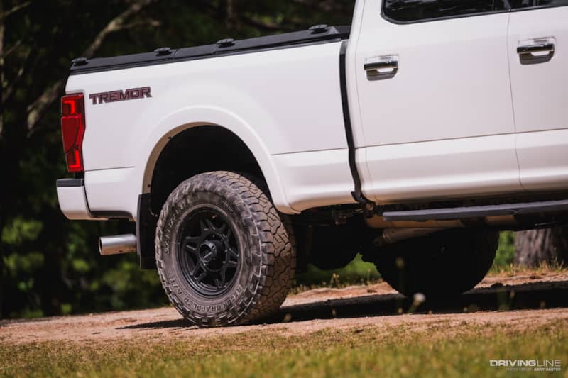 rear wheel and bed of a F250 Platinum Tremor with Nitto Recon Grappler Tires