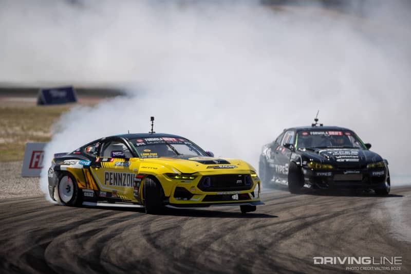 Chelsea DeNofa Tandem Drifting against mike Powers at 2023 Formula Drift Utah