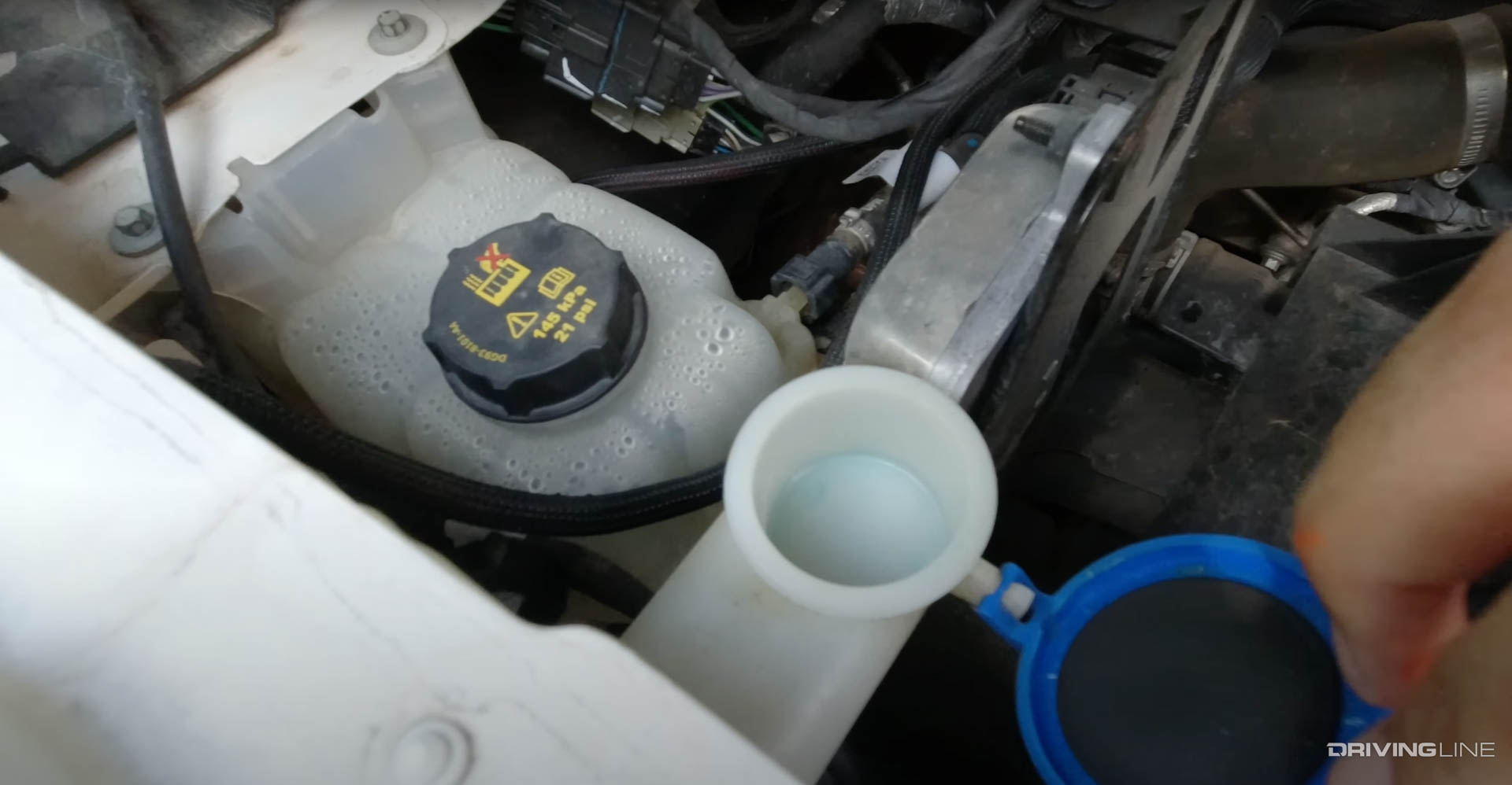 Coolant container and windshield fluid in Ford Bronco Raptor