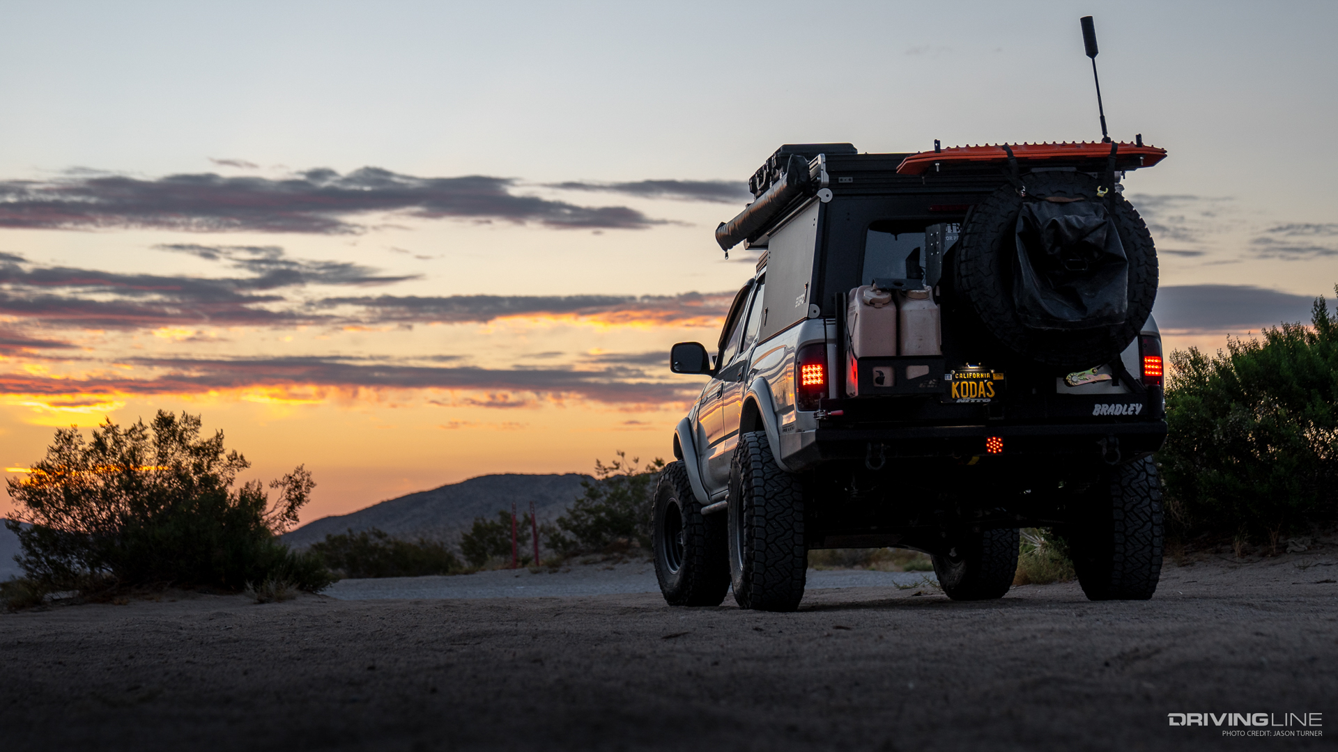 Overlanding Toyota Tacoma rear end at sunset