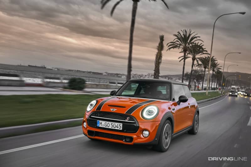 2020 Mini Cooper S front view orange on road