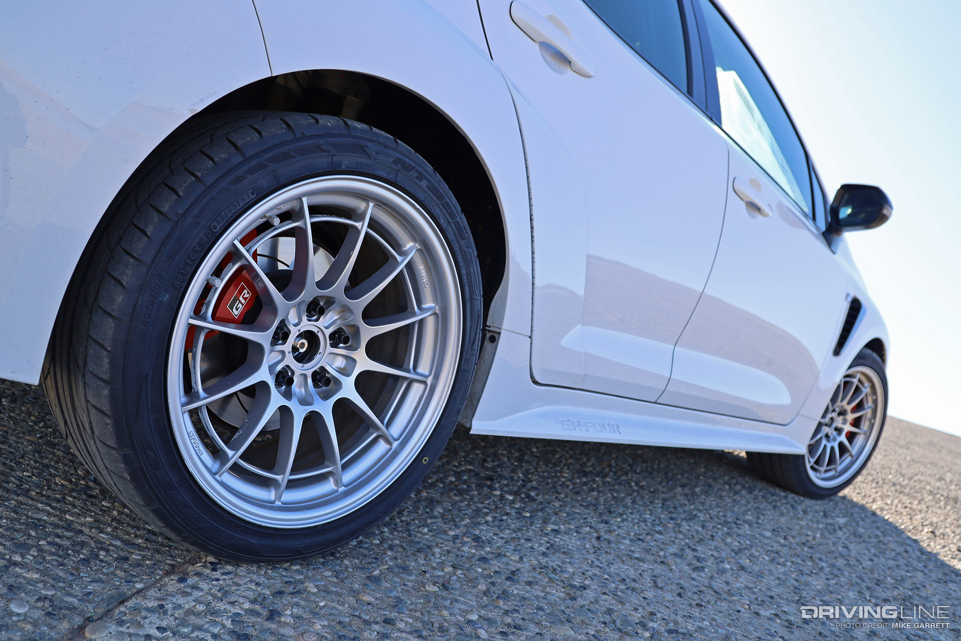 Toyota GR Corolla on Nitto NT555 G2 and Enkei NT03+M