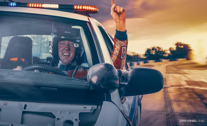 CLeetus McFarland driving "Neighbor" the supercharged Crown Victoria