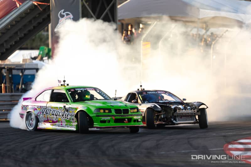 Rome Charpentier tandem drifting against Matt Field at 2023 Formula Drift Long Beach
