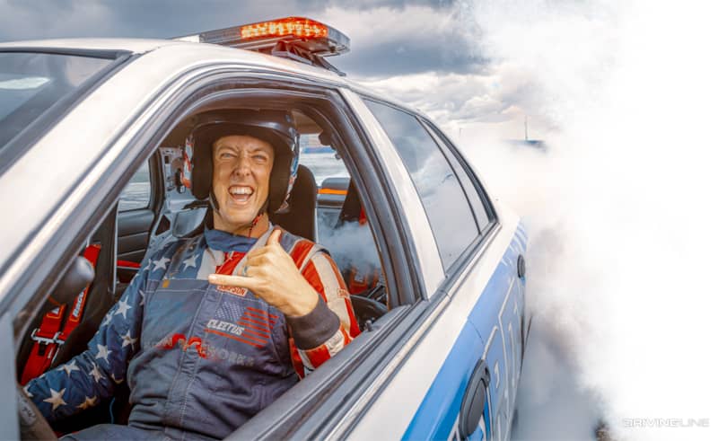 Cleetus McFarland doing a smokey burnout in a Ford Crown Victoria