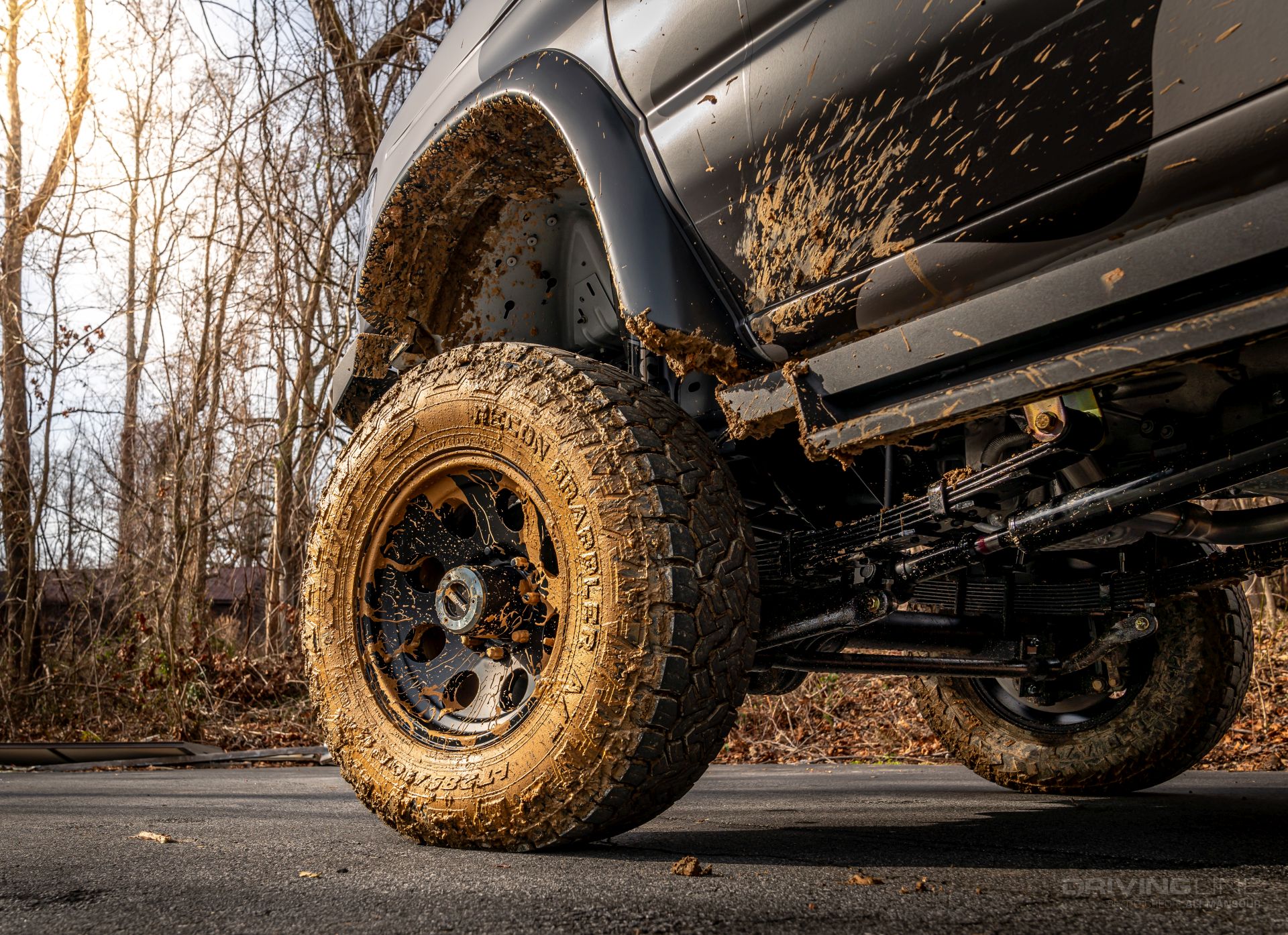 Nitto Recon Grappler AT muddy tire side view Dynatrac free spin kit Ujoint offroad