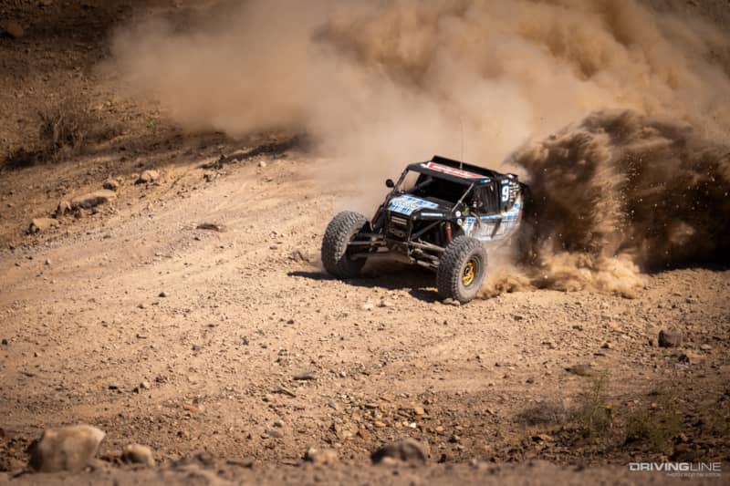 bryan Crofts kicking up dirt in his Nitto Trail Grappler equipped 4400-Class Ultra4 car