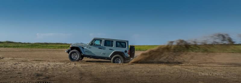 2024 Jeep Wrangler Rubicon 392 2WD with Tazer JL Mini kicking up dust