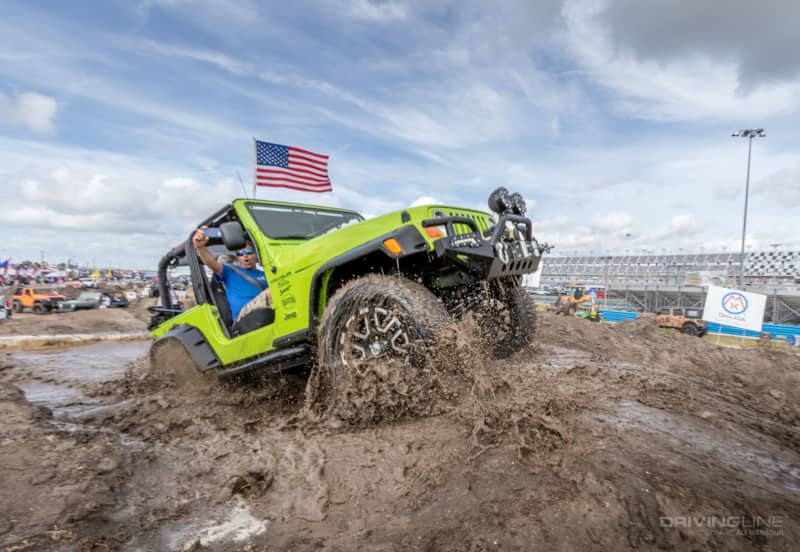 Green Jeep Wrangler TJ mud off-road course Jeep Beach Daytona Speedway