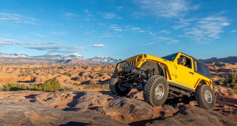 Yellow Jeep Wrangler two door Hells Revenge Moab Utah