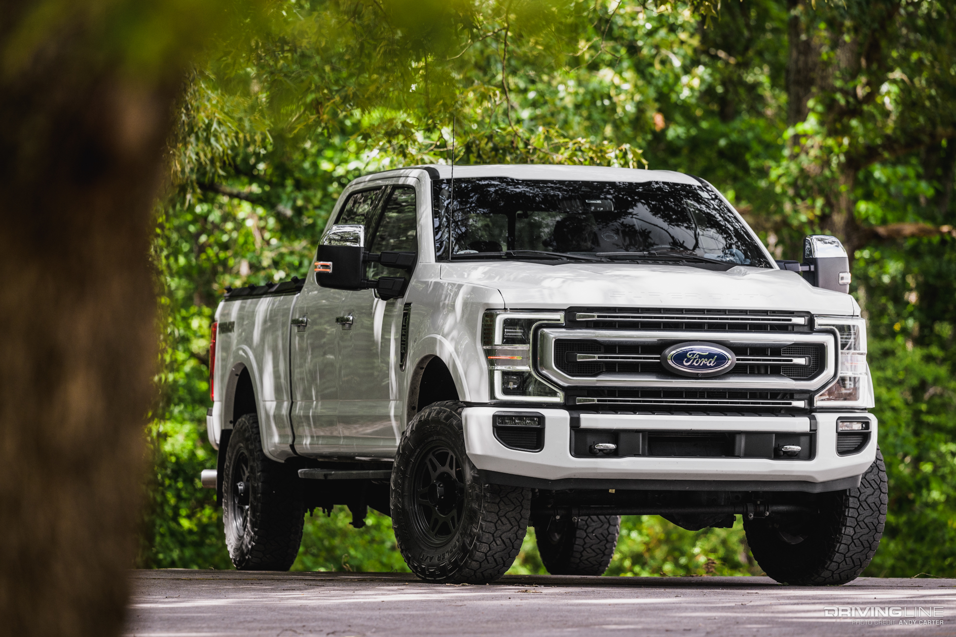 3/4 front passenger side of F-250 Platinum Tremor with Nitto Recon Grappler Tires