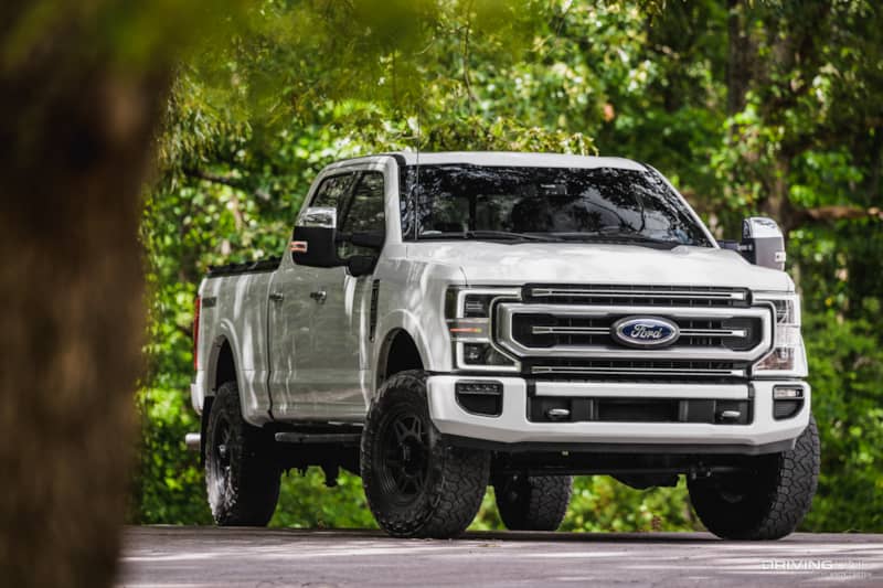 3/4 front passenger side of F-250 Platinum Tremor with Nitto Recon Grappler Tires