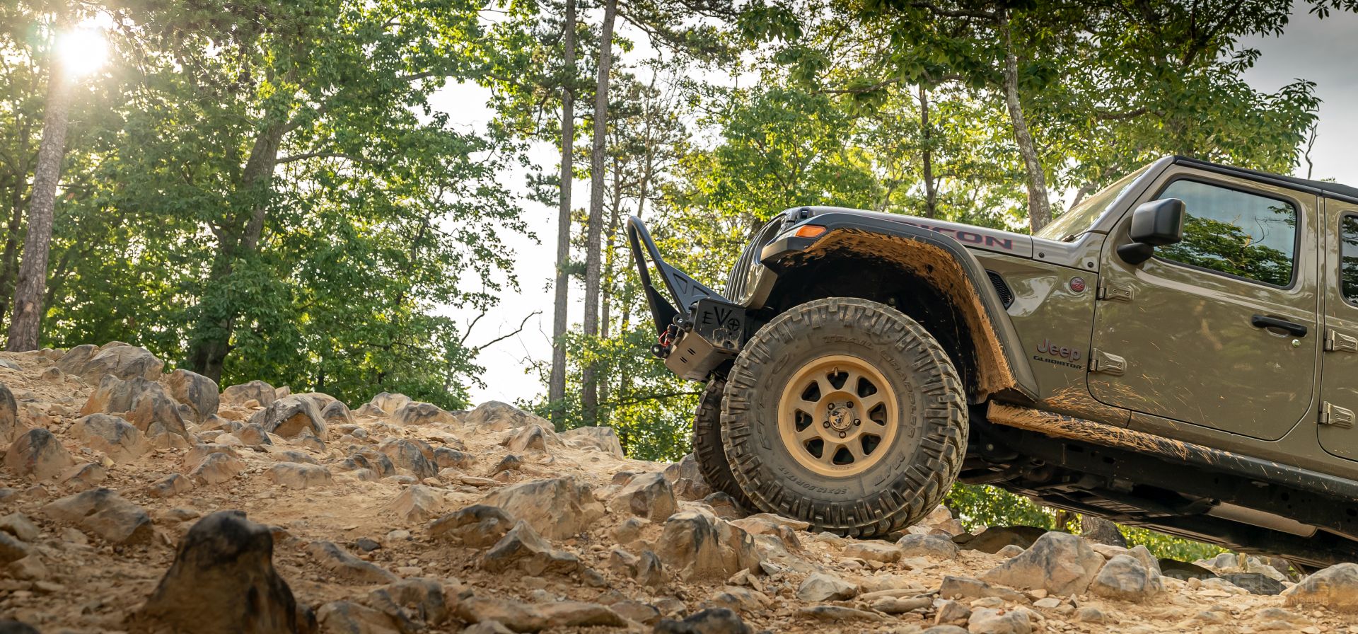 2020 Jeep Gladiator Rubicon off-road on 38s EVO MFG winch bumper uwharrie sideview
