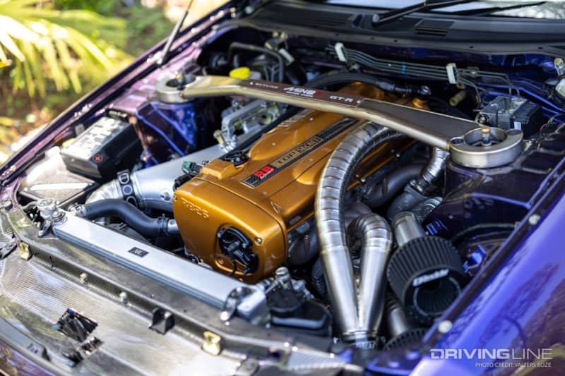 The engine bay of Adam LZ's Skyline R34 received a full engine-out overhaul and is significantly improved from how it rolled off the showroom floor in 1999